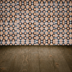 Image showing Wood table top and blur vintage ceramic tile pattern wall