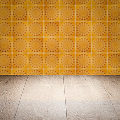 Image showing Wood table top and blur vintage ceramic tile pattern wall