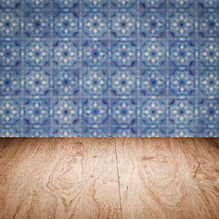 Image showing Wood table top and blur vintage ceramic tile pattern wall