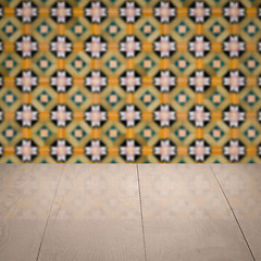 Image showing Wood table top and blur vintage ceramic tile pattern wall