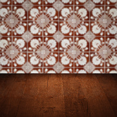 Image showing Wood table top and blur vintage ceramic tile pattern wall