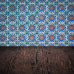 Image showing Wood table top and blur vintage ceramic tile pattern wall