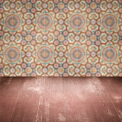 Image showing Wood table top and blur vintage ceramic tile pattern wall