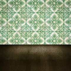 Image showing Wood table top and blur vintage ceramic tile pattern wall