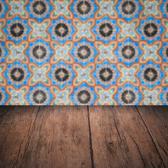 Image showing Wood table top and blur vintage ceramic tile pattern wall