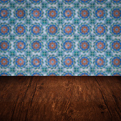 Image showing Wood table top and blur vintage ceramic tile pattern wall