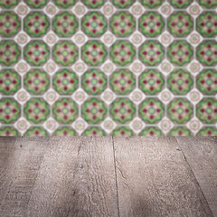 Image showing Wood table top and blur vintage ceramic tile pattern wall