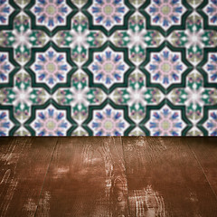 Image showing Wood table top and blur vintage ceramic tile pattern wall