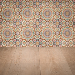 Image showing Wood table top and blur vintage ceramic tile pattern wall