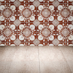 Image showing Wood table top and blur vintage ceramic tile pattern wall