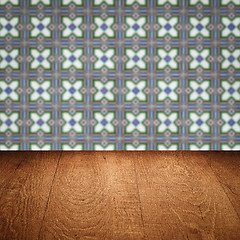 Image showing Wood table top and blur vintage ceramic tile pattern wall