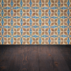 Image showing Wood table top and blur vintage ceramic tile pattern wall