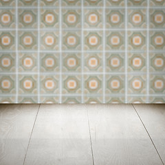 Image showing Wood table top and blur vintage ceramic tile pattern wall