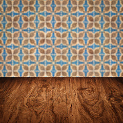 Image showing Wood table top and blur vintage ceramic tile pattern wall