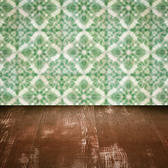 Image showing Wood table top and blur vintage ceramic tile pattern wall