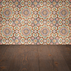 Image showing Wood table top and blur vintage ceramic tile pattern wall