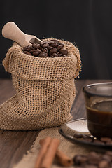 Image showing Coffee cup with burlap sack