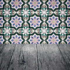 Image showing Wood table top and blur vintage ceramic tile pattern wall