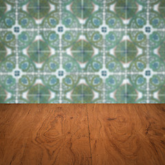 Image showing Wood table top and blur vintage ceramic tile pattern wall