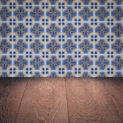 Image showing Wood table top and blur vintage ceramic tile pattern wall