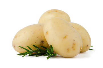 Image showing New potatoes and green herbs