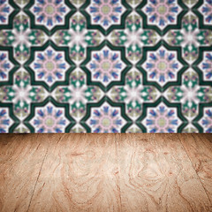 Image showing Wood table top and blur vintage ceramic tile pattern wall