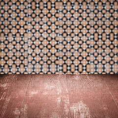 Image showing Wood table top and blur vintage ceramic tile pattern wall