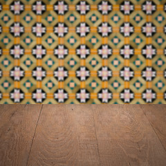 Image showing Wood table top and blur vintage ceramic tile pattern wall