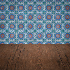 Image showing Wood table top and blur vintage ceramic tile pattern wall