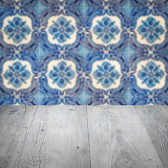 Image showing Wood table top and blur vintage ceramic tile pattern wall