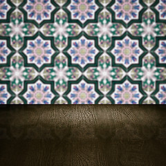 Image showing Wood table top and blur vintage ceramic tile pattern wall