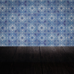 Image showing Wood table top and blur vintage ceramic tile pattern wall