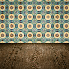 Image showing Wood table top and blur vintage ceramic tile pattern wall