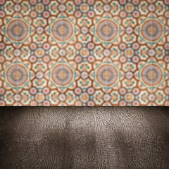 Image showing Wood table top and blur vintage ceramic tile pattern wall