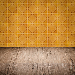 Image showing Wood table top and blur vintage ceramic tile pattern wall