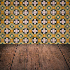 Image showing Wood table top and blur vintage ceramic tile pattern wall