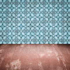 Image showing Wood table top and blur vintage ceramic tile pattern wall