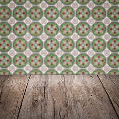 Image showing Wood table top and blur vintage ceramic tile pattern wall