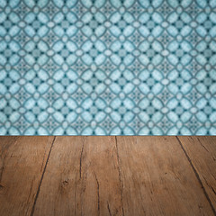 Image showing Wood table top and blur vintage ceramic tile pattern wall