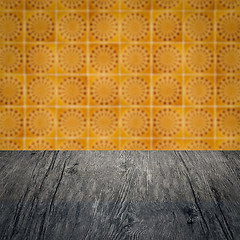 Image showing Wood table top and blur vintage ceramic tile pattern wall