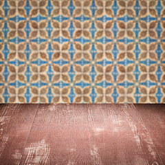 Image showing Wood table top and blur vintage ceramic tile pattern wall