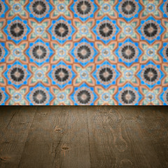 Image showing Wood table top and blur vintage ceramic tile pattern wall