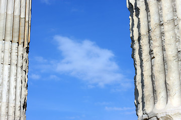 Image showing Blue clouded sky between two ancient Greek columns
