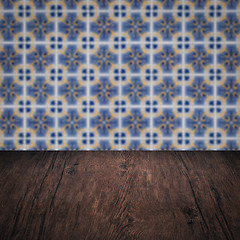 Image showing Wood table top and blur vintage ceramic tile pattern wall