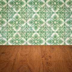 Image showing Wood table top and blur vintage ceramic tile pattern wall