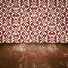 Image showing Wood table top and blur vintage ceramic tile pattern wall