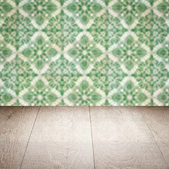 Image showing Wood table top and blur vintage ceramic tile pattern wall