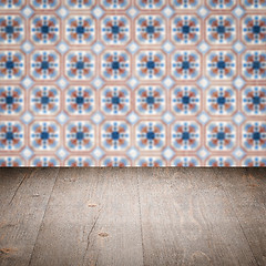 Image showing Wood table top and blur vintage ceramic tile pattern wall