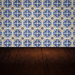 Image showing Wood table top and blur vintage ceramic tile pattern wall