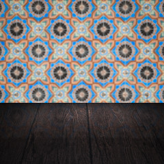 Image showing Wood table top and blur vintage ceramic tile pattern wall